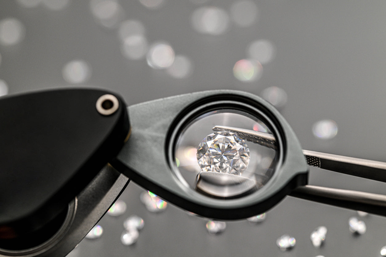 Diamond being examined with a gemological loupe